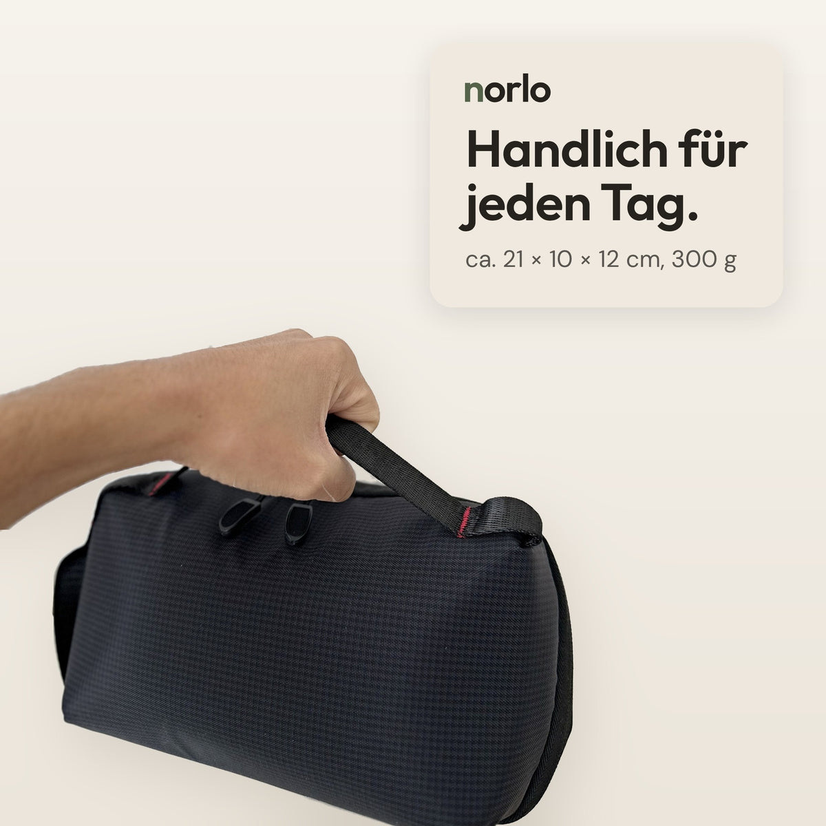 Organizer tech tenuto in mano, ca. 21 × 10 × 12 cm
